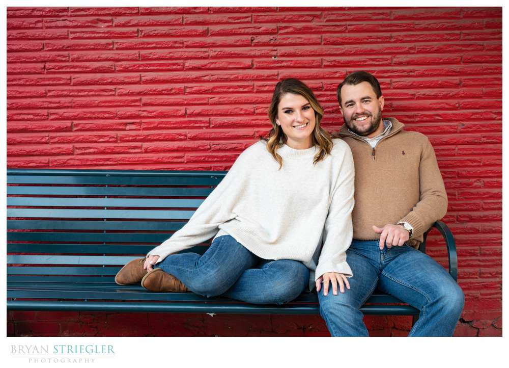 engagement photo with red brick